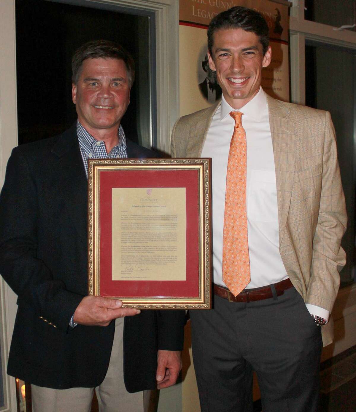 The Washington Lions Club was recently presented the Gunnery's Friend of the Green Award. Above, John Quist, president of the Washington Lions Club, left, receives the award from Head of School Peter Becker.