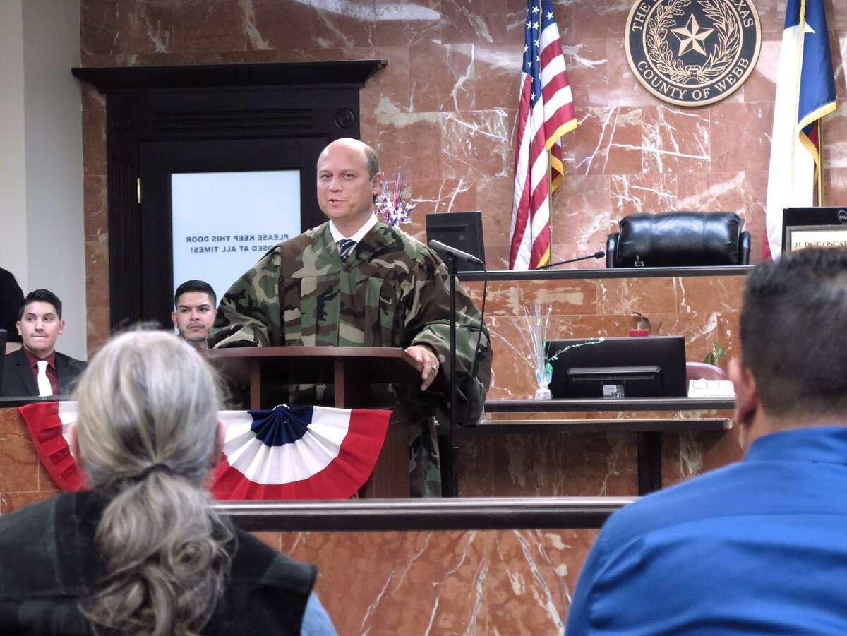 406th District Judge Oscar J. Hale Jr., at podium, addresses five graduates, including Mark Nagele, 60, in black vest, of the Eight 406th and 341st District Courts Veterans Treatment Program Wednesday afternoon at the 406th Courtroom. This 13-month program is designed to help Veterans overcome struggles with drug and alcohol addiction and lead them on the path to sobriety and success. Upon completion of the program, all related charges are dismissed from their records.