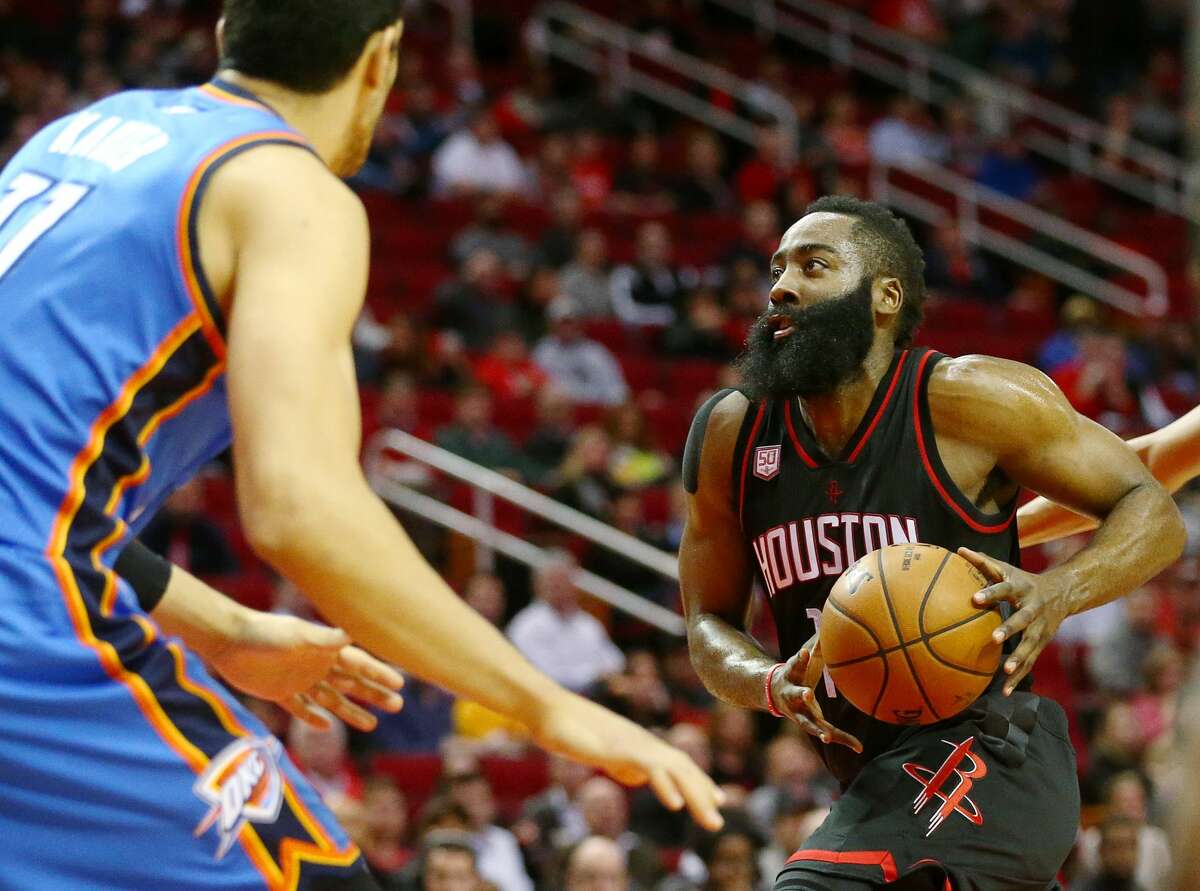 Houston Rockets guard James Harden (13) drives to the basket during the first quarter of an NBA game at the Toyota Center, Thursday, Jan. 5, 2017, in Houston. ( Jon Shapley / Houston Chronicle )