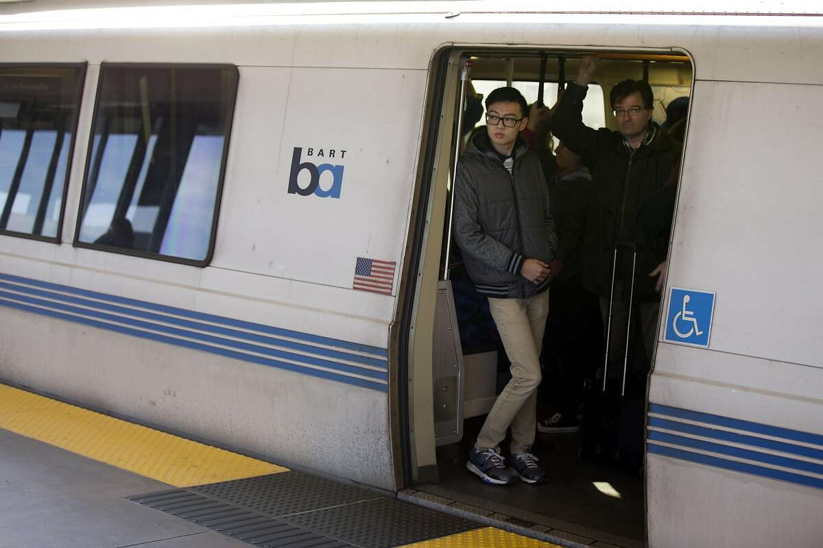 A BART train sits at the West Oakland station, waiting for traffic ahead of it to clear, after a disabled train created 30-minute delays across the system on Friday, Jan. 6, 2017 in Oakland, Calif.