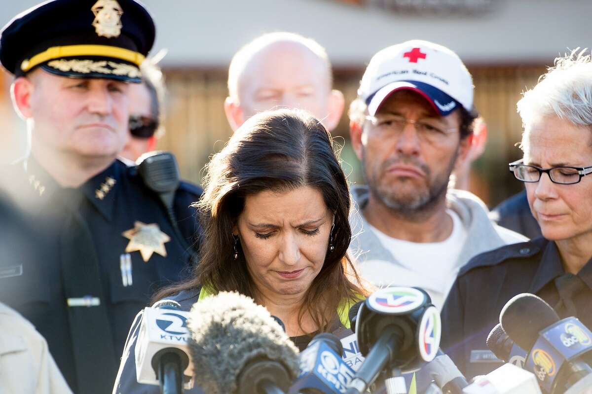 Oakland Mayor Libby Schaaf pauses during a press conference at the scene of a fatal fire in Oakland, Calif., on Saturday, Dec. 3, 2016.