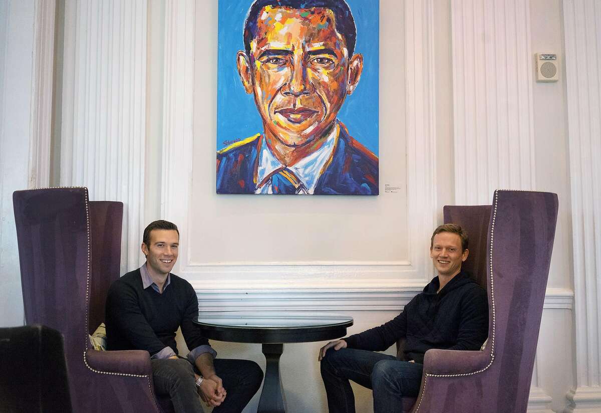 Together the voice behind the popular snarky partisan podcast called "Keepin' it 1600," President Obama's long time speech writer, Jon Favreau, left, and Obama White House veteran, Tommy Vietor, sit in the lobby of the W Hotel on Friday January 6, 2017 in Washington D.C. The two, with the help of another entrepreneur Jon Lovett (not shown), are leaving their West Coast consulting jobs to bootstrap a new media company they are calling "Crooked Media." Their new podcast dubbed "Pod Save America" debuts Monday.