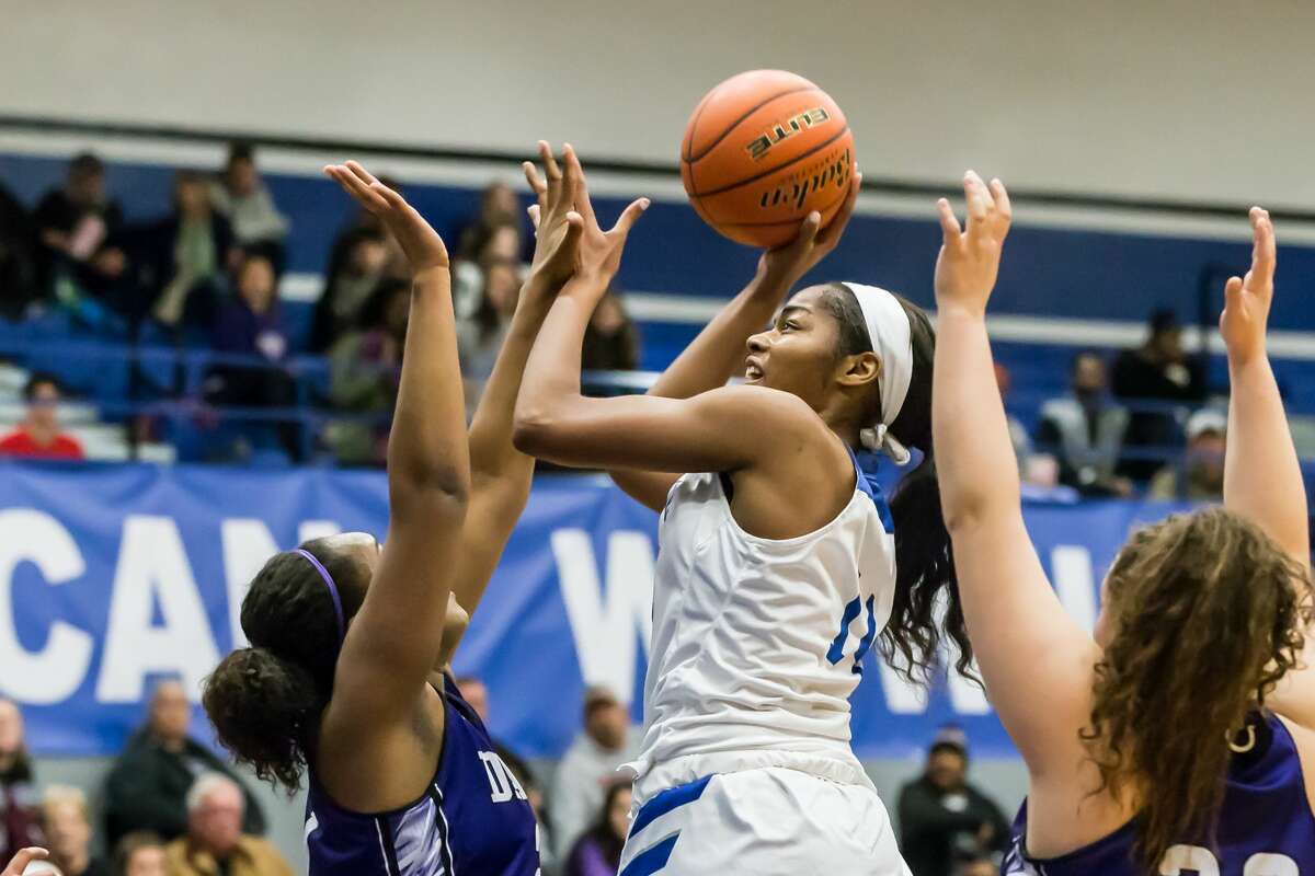 January 6, 2017: Barbers Hill's Charli Collier goes up for a layup in the basketball game against rival Dayton Broncos at Barbers Hill Field House in Mont Belvieu, Texas. (Leslie Plaza Johnson/Freelance)