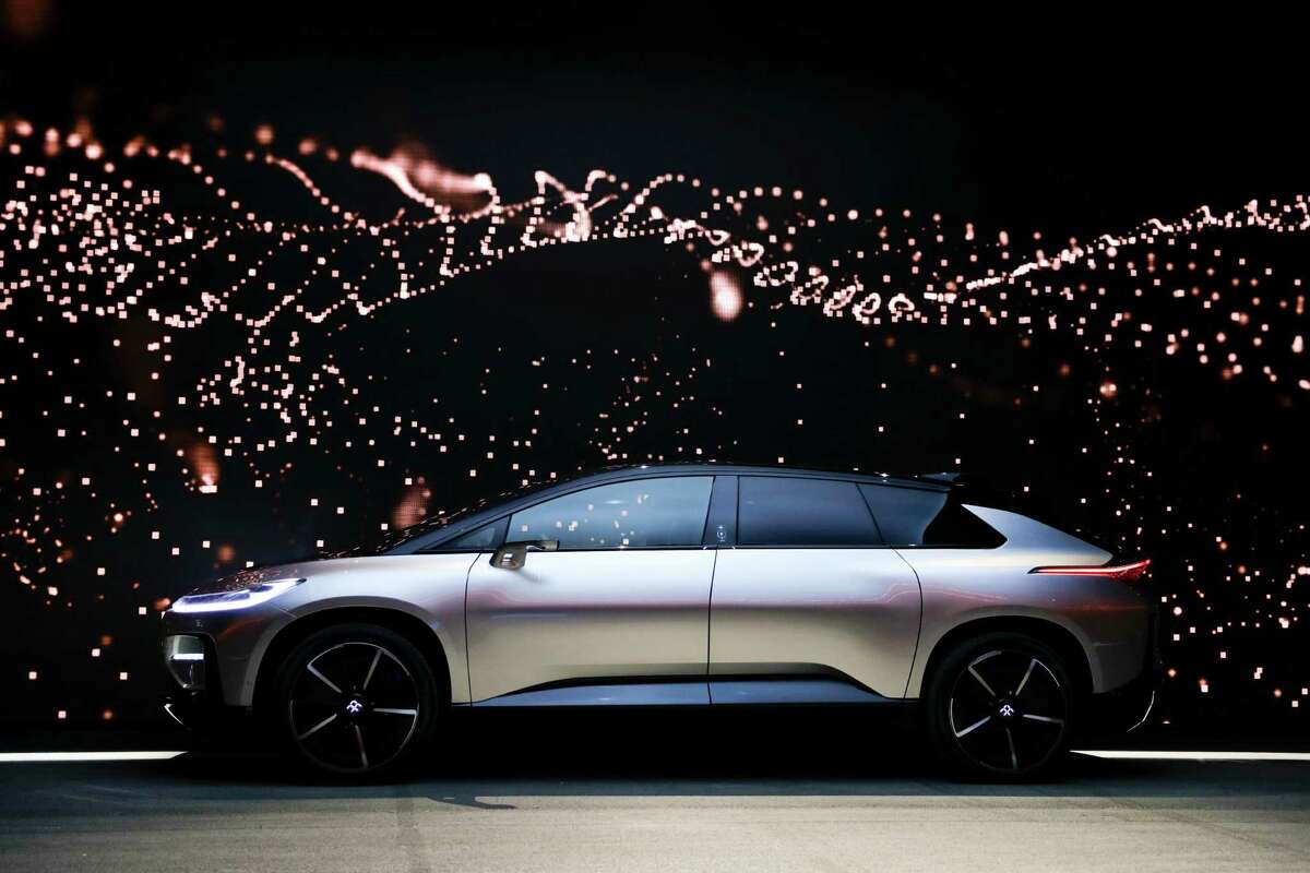 Faraday Future's FF91 electric car is unveiled during a news conference at CES International Tuesday, Jan. 3, 2017, in Las Vegas. (AP Photo/Jae C. Hong)