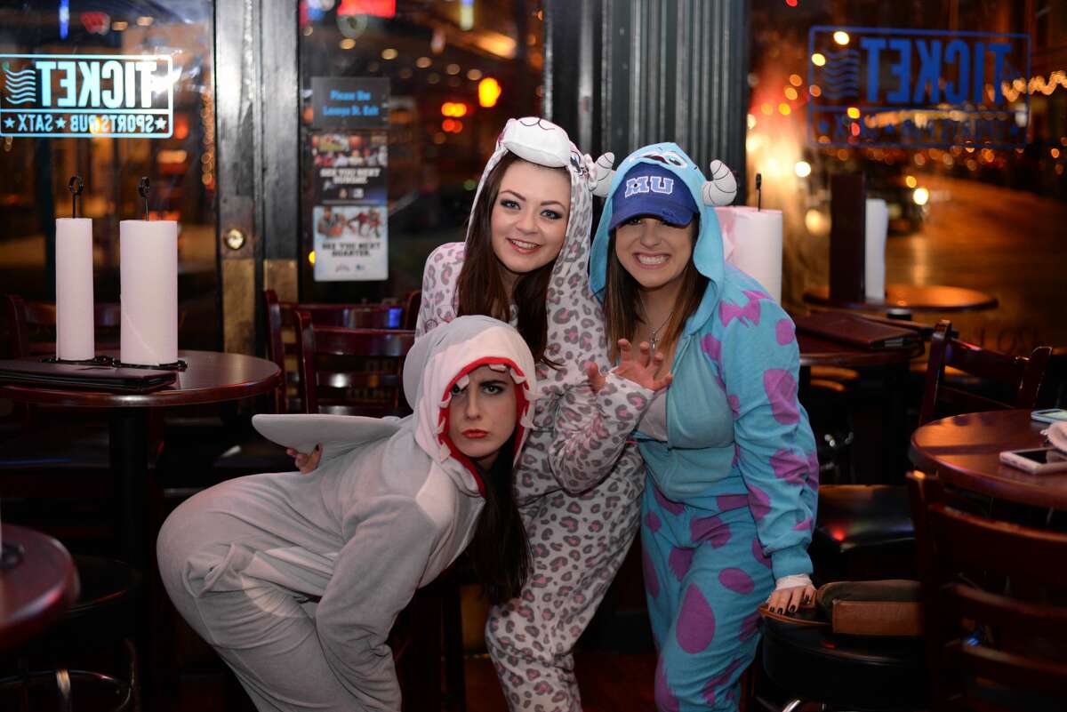 One of the best ways to beat the cold is a warm pair of pajamas, vigorous walking and multiple alcoholic drinks. Area residents put this to the test Friday night, Jan. 7, 2017, during the Onesie Pub Crawl.