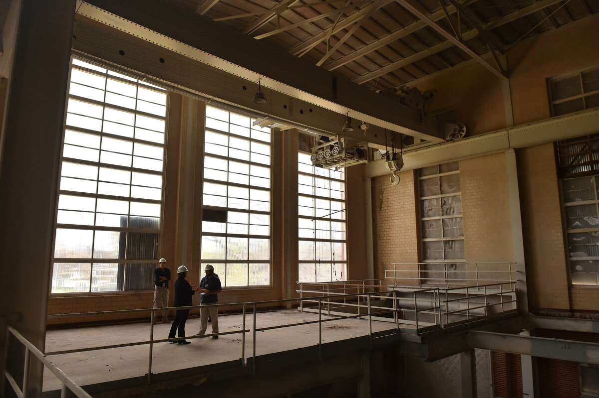 Kimberly Britton, the project’s CEO, leads a tour of the former Mission Road Power Plant being renovated. The power plant, built in the early 1900s, sits along the River Walk and southeast of the soon-to-be developed former Lone Star Brewery.