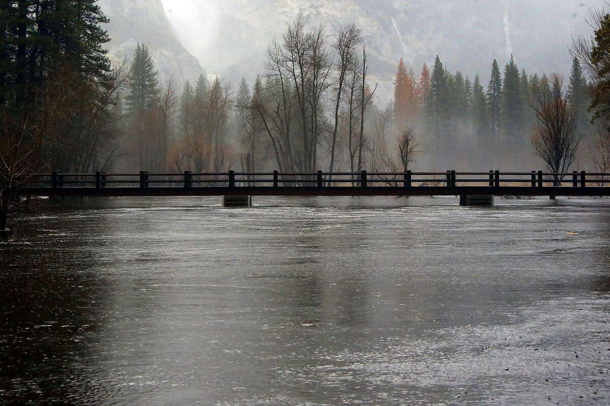 Flood stage: The level at which a river rises enough to cause sufficient inundation of areas that are not normally covered by water, causing an inconvenience or a threat to life and/or property. When the water rises to this level, it is considered a flood event. In this photo, the Merced River rises to just below Swinging Bridge in Yosemite National Park, which was under a flash flood watch, on Sunday Jan. 8, 2017.