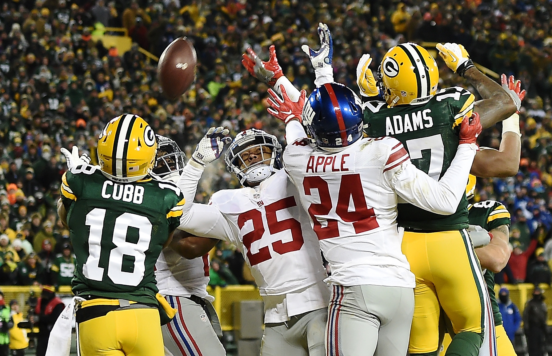 Green Bay Packers wide receiver Randall Cobb (18) reacts after making  yardage during the first quarter of an NFL game between the New York Giants  and the Green Bay Packers at the