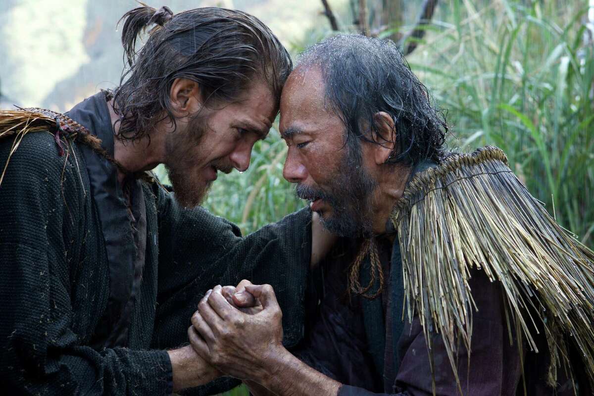 Father Rodrigues (Andrew Garfield) consoles a Japanese Christian (Shinya Tsukamoto) in a scene from “Silence.”