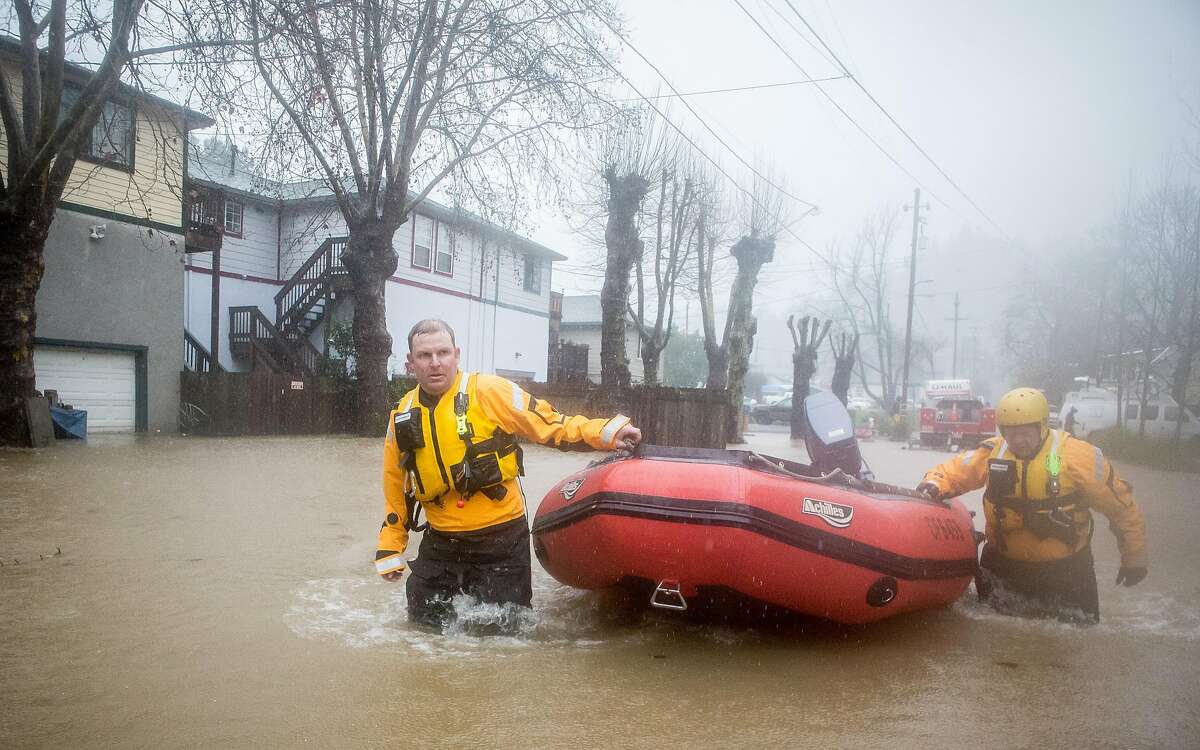 Russian River fire crews head into floodwaters looking for people in distress in Guerneville, Calif. Tuesday, January 10, 2017. Major winter storms drenched much of the bay area leaving some of it flooded.