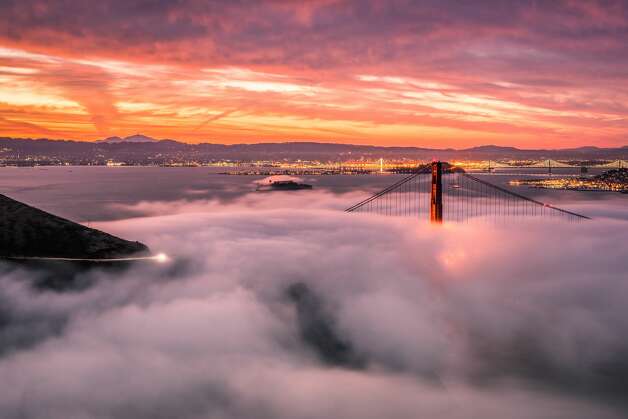 p>An epic sunrise with low fog at the Golden Gate... 12171735 - SFGate