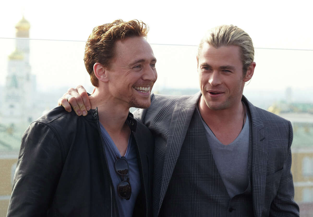 Actors <b>Tom</b> <b>Hiddleston</b> and <b>Chris</b> <b>Hemsworth</b> pose for photo on the roof of Rit...