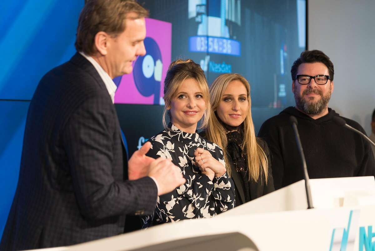 Sarah Michelle Gellar, second from left, listens to Nasdaq Vice Chairman Bruce Aust speak at the stock exchange's West Coast office in San Francisco, Calif. on Wednesday, Jan. 11, 2017. Sarah Michelle Gellar has a food startup which has gone through the Nasdaq incubation program.