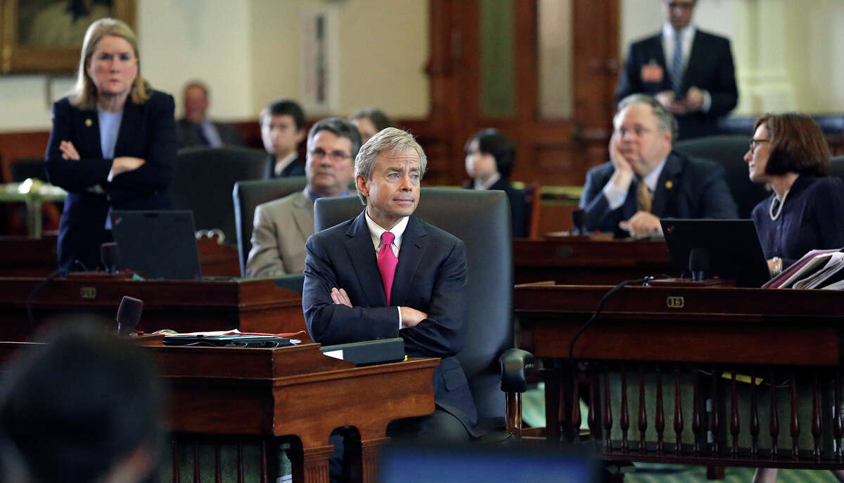 Sen. Don Huffines, R-Dallas,center, listens to testimony during a Senate hearing earlier this month.