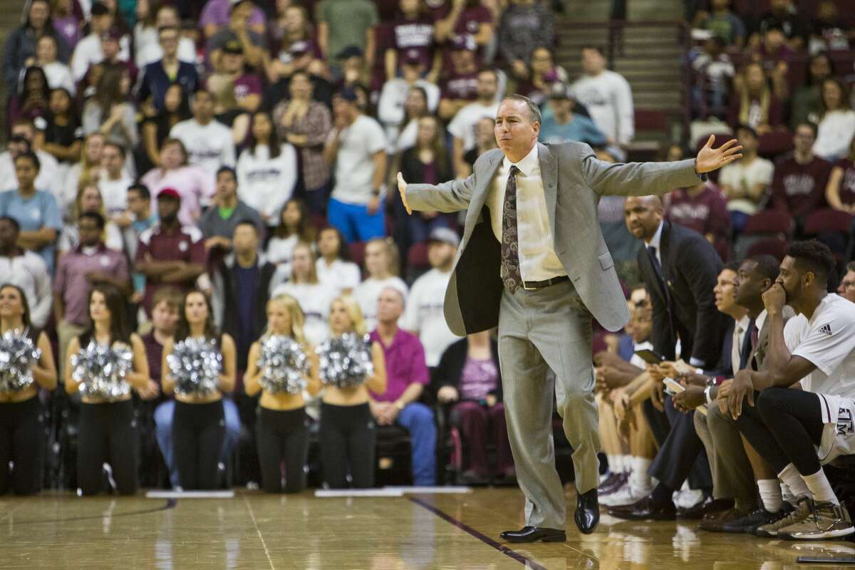 Texas A&M coach Billy Kennedy gestures during the team's NCAA college basketball game. (Timothy Hurst/College Station Eagle via AP)