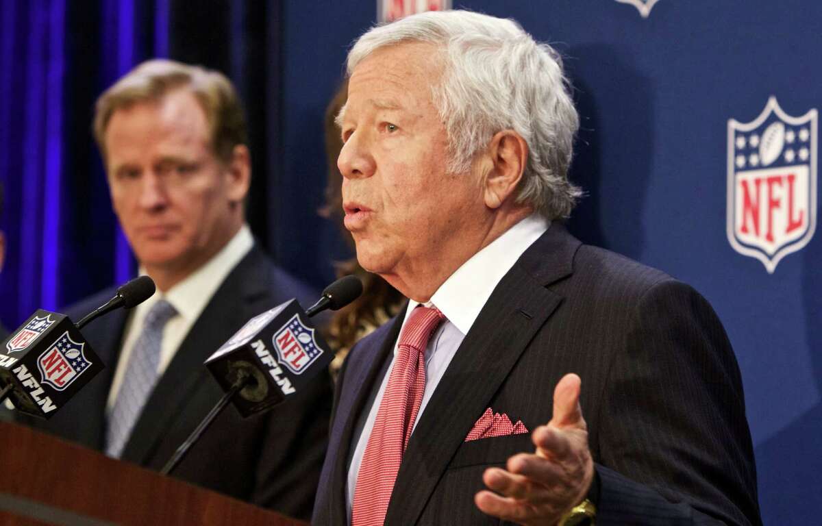 New England Patriots owner Robert Kraft speaks at an NFL press conference announcing new measures for the league's personal conduct policy during an owners meeting, Wednesday, Dec. 10, 2014, in Irving, Texas. NFL commissioner Roger Goodell looks on at left. (AP Photo/Brandon Wade)