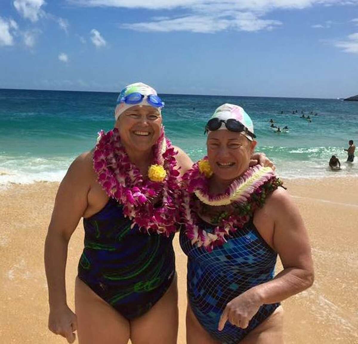 Westport's Elizabeth Fry (right) swam 17 hours and 30 minutes across the 42 kilometer Molokai Channel.