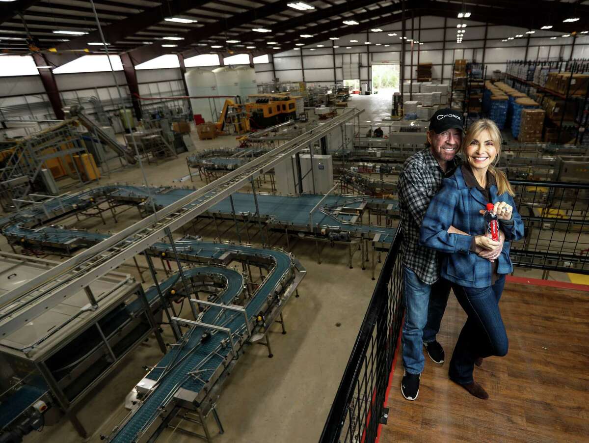 Chuck and Gena Norris, inside the CForce bottling plant.