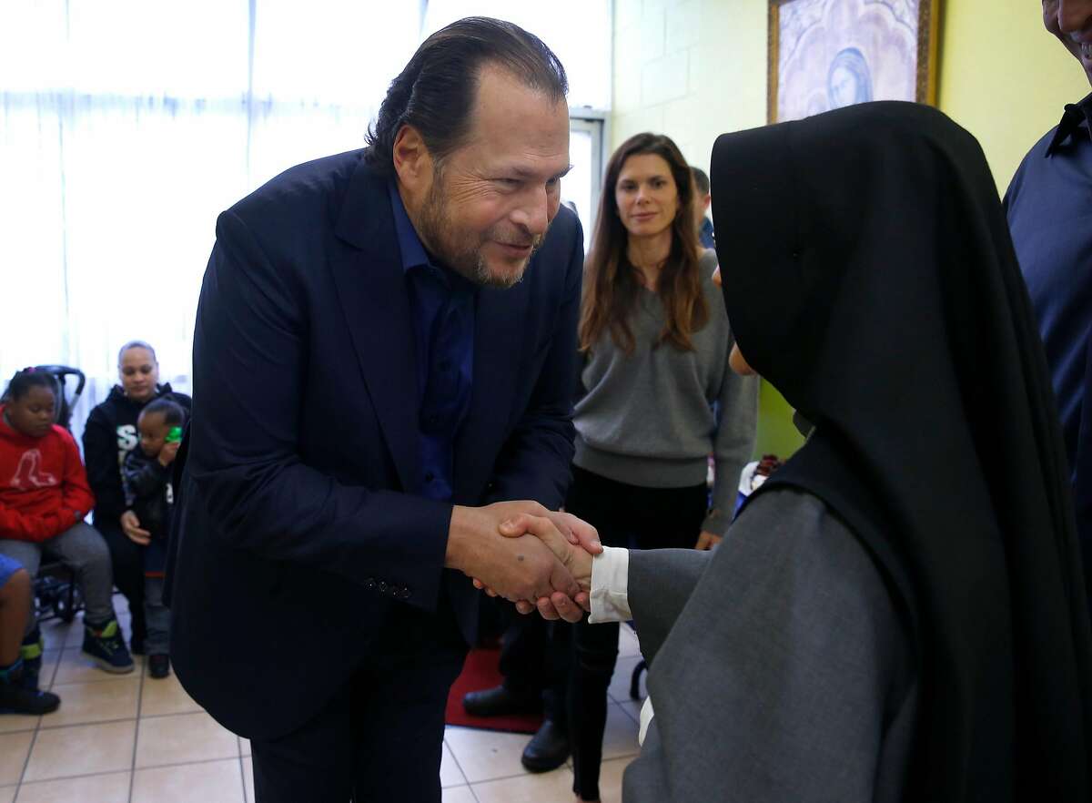 Salesforce CEO and philanthropist Marc Benioff meets with Sister Mary Valerie while his wife Lynne (center) looks on at the current Fraternite Notre Dame Mary of Nazareth House soup kitchen in San Francisco, Calif. on Thursday, Jan. 12, 2017. Self-improvement guru Tony Robbins stepped in to buy a new location for the nuns' soup kitchen at 16th and Mission streets after they were evicted from the current site on Turk Street and today the planning commission is voting whether to grant permission to allow the nuns to reopen the kitchen.