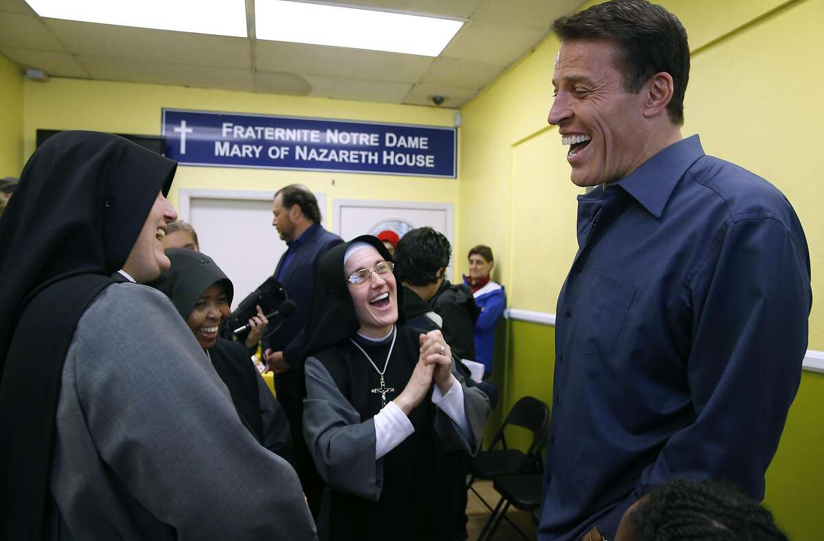 Tony Robbins meets with Sisters Mary Benedicte (left), Mary of the Angels and Mary Valerie at the current Fraternite Notre Dame Mary of Nazareth House soup kitchen in San Francisco, Calif. on Thursday, Jan. 12, 2017. Robbins, the multi-millionaire self-improvement guru, stepped in to buy a new location for the nuns' soup kitchen at 16th and Mission streets after they were evicted from the current site on Turk Street and today the planning commission is voting whether to grant permission to allow the nuns to reopen the kitchen.