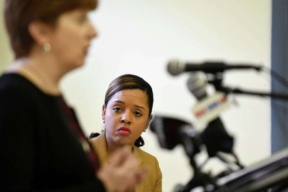 First Ward Council member Dorcey Applyrs listens as Mayor Kathy Sheehan, left, speaks during an event to commemorate the three year anniversary of first press conference held to bring to light the plight of the residents of Ezra Prentice Homes in the wake of an increase in oil train traffic on Thursday, Jan. 12, 2017, in Albany, N.Y. The housing complex sits adjacent to an oil tanker unloading site at the Port of Albany. (Will Waldron/Times Union)