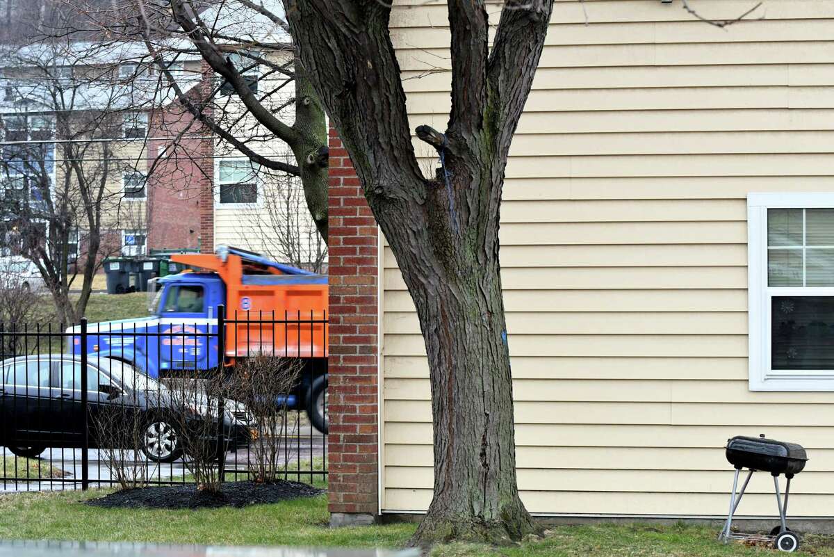 A tractor-trailer on South Pearl St. is viewed through the backyard of an Ezra Prentice housing complex unit on Thursday, Jan. 12, 2017, in Albany, N.Y. (Will Waldron/Times Union)