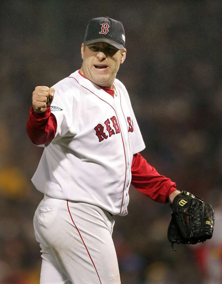 Boston Red Sox pitcher Curt Schilling gestures after St. Louis Cardinals Scott Rolen was out at third base on a fielders choice, to end the sixth inning during Game 2 of the World Series at Fenway Park in Boston, October 24, 2004.  Photo: RAY STUBBLEBINE, REUTERS