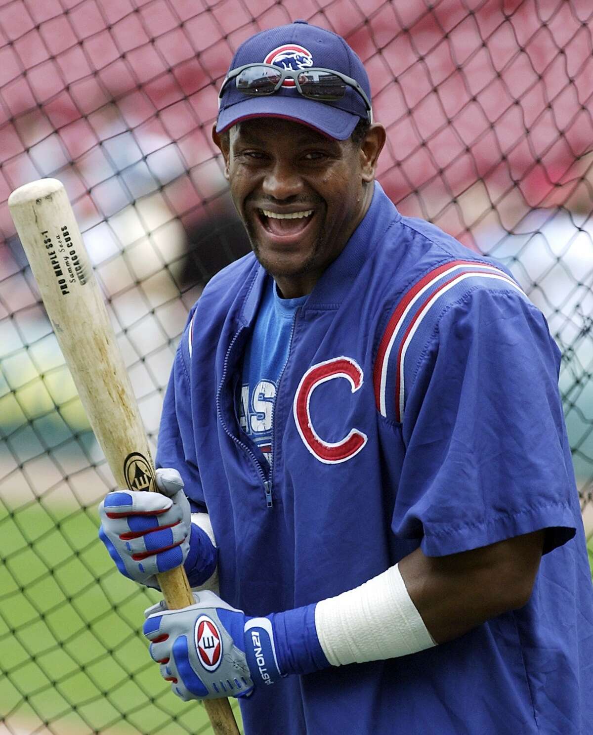 In this June 18, 2003 file photo, Chicago Cubs' Sammy Sosa smiles during batting practice prior to a baseball game with the Cincinnati Reds in Cincinnati. The New York Times reported on its website Tuesday, June 16, 2009, that Sosa tested positive for a performance-enhancing drug in 2003, citing lawyers familiar with the case. The newspaper did not identify the drug. (AP Photo/Al Behrman, File)