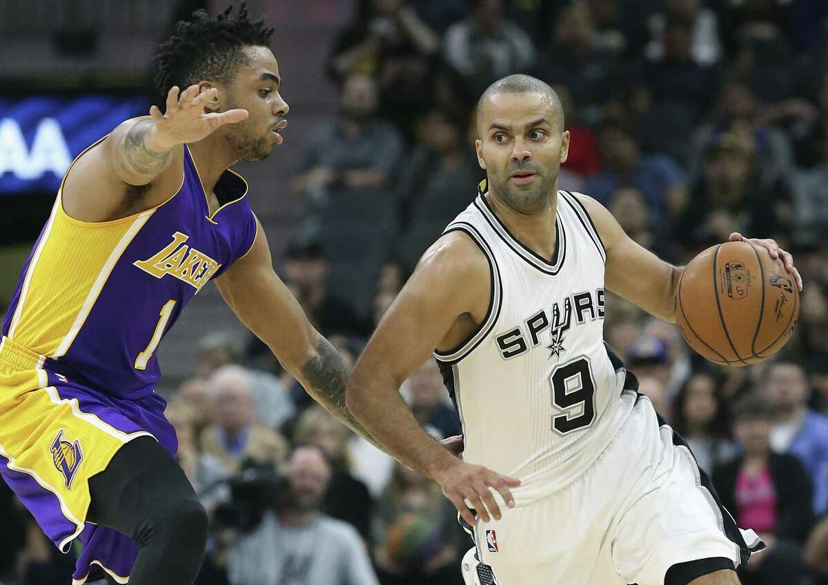 Tony Parker eyes movement in the lane as he drives on D’Angelo Russell on Jan. 12, 2017.
