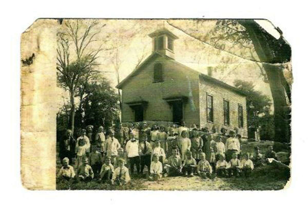 Staff and students outside Westport’s Cross Highway School in this undated photo.