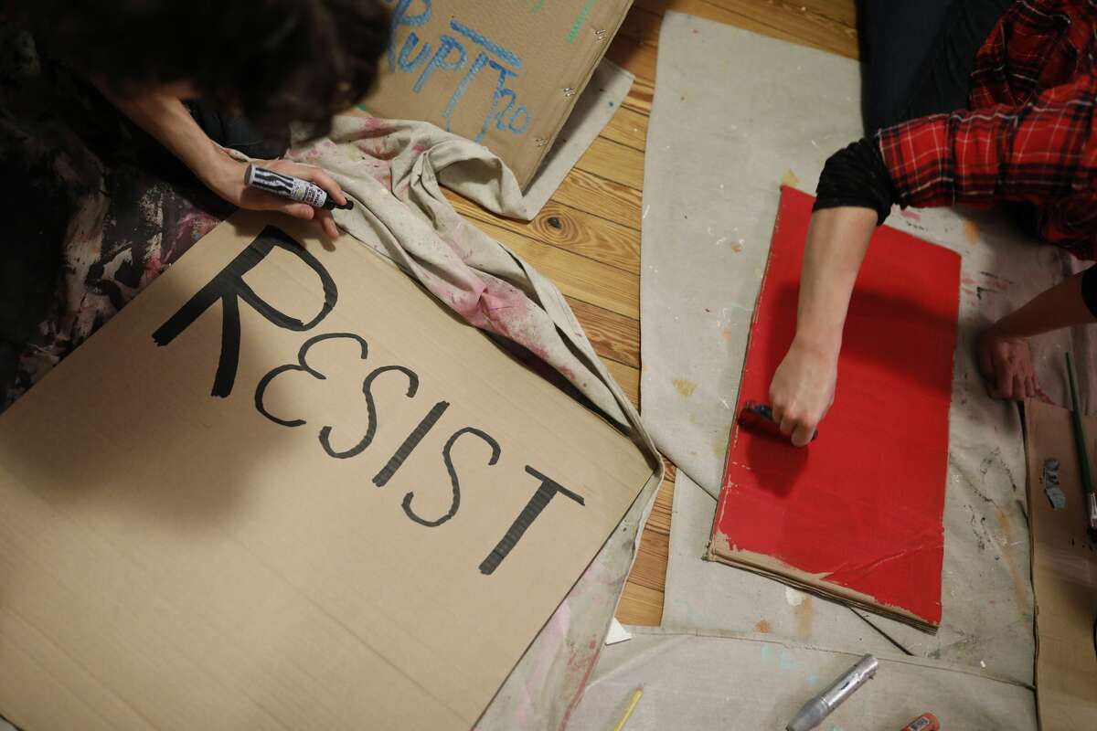 WASHINGTON, DC - JANUARY 11: Activists gather to make signs for demonstrations against the upcoming inauguration of Donald Trump January 11, 2017 in Washington, DC. The Inauguration is expected to bring thousands of activists and supporters to Washington. (Photo by Aaron P. Bernstein/Getty Images)