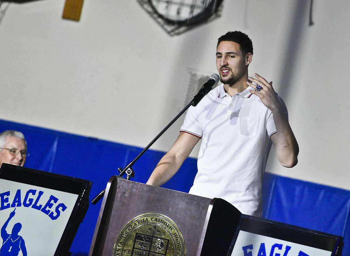Klay Thompson gives brief remarks during the retirement ceremony for his jersey at Santa Margarita Catholic High School on Friday. Golden State Warriors NBA player Klay Thompson has his jersey retired at his high school alma mater, Santa Margarita Catholic High School on Friday, Jan. 13, 2017 in Ranch Santa Margarita,Calif.