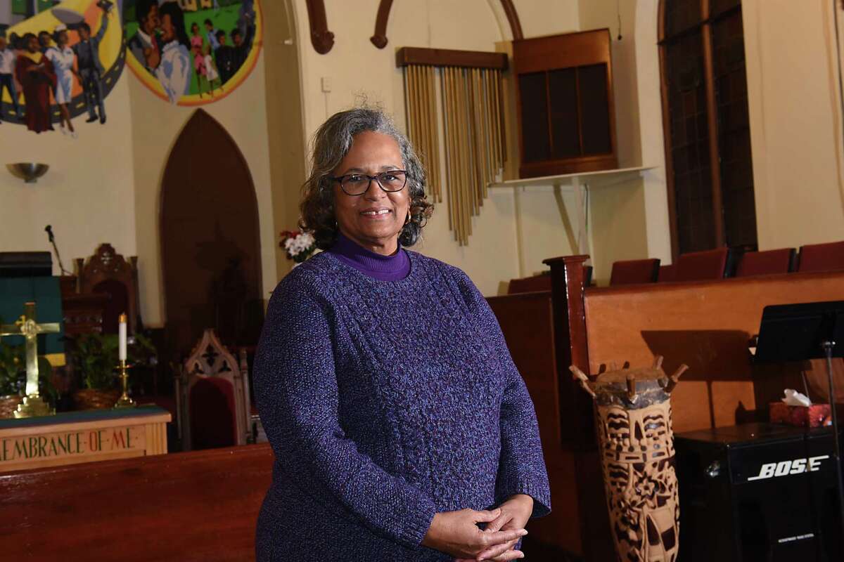 Lynn Canton stands in front of the alter in the Israel African Methodist Episcopal Church on Tuesday, Jan. 10, 2017 in Albany, N.Y. Canton worked with the NYS Landmarks Conservancy on a Sacred Sites grant for the historic black church which was a stop on the Underground Railroad. (Lori Van Buren / Times Union)