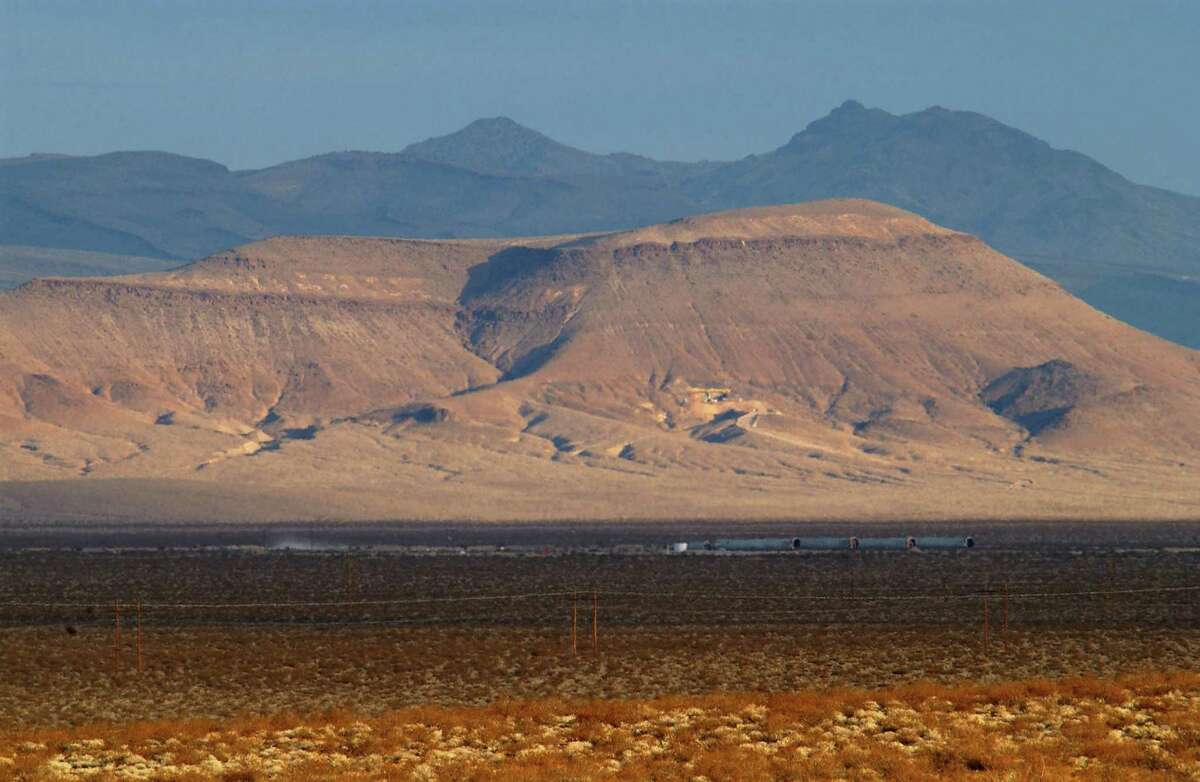 Early morning light shines on the proposed nuclear waste dump site of Yucca Mountain in 2002 at Nellis Air Force Base, located approximately 90 miles north of Las Vegas, Nev. The retirement of former Senate Majority Leader Harry Reid paves the way for a renewed push to make this a permanent waste site.