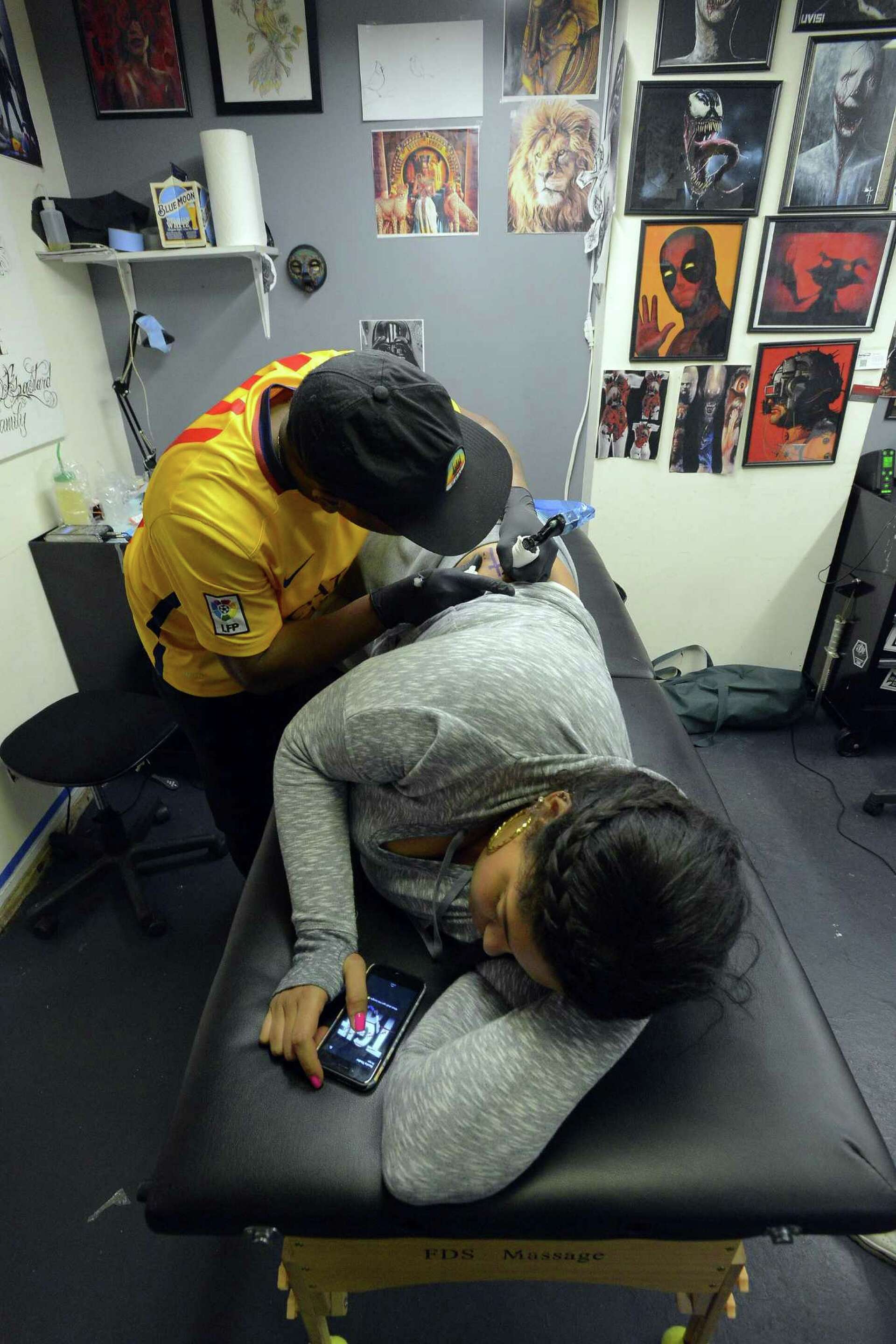 Tattoo fans find special deals on Friday the 13th