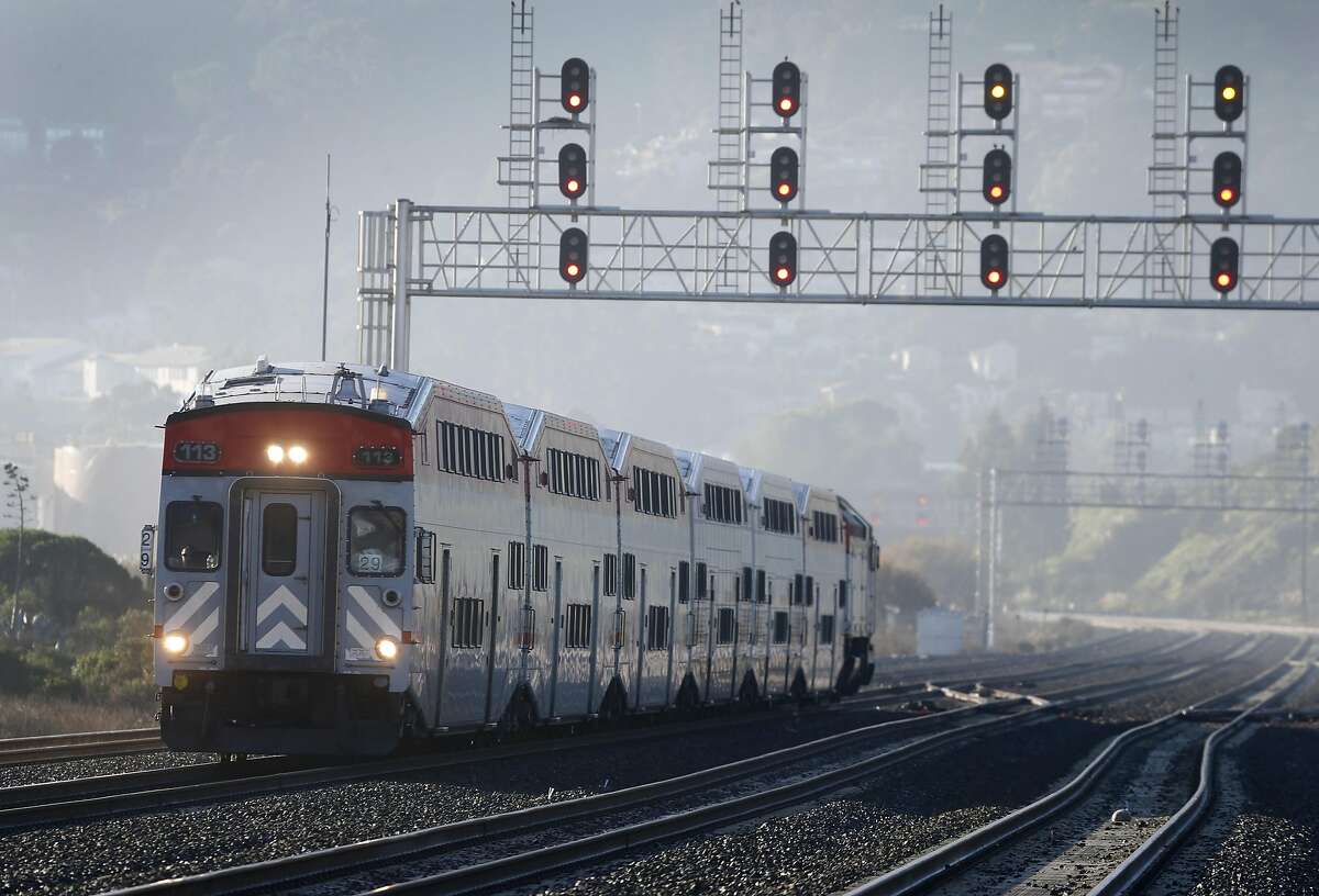 A northbound express train approaches the Bayshore Caltrain station in Brisbane, Calif. on Friday, Jan. 13, 2017.