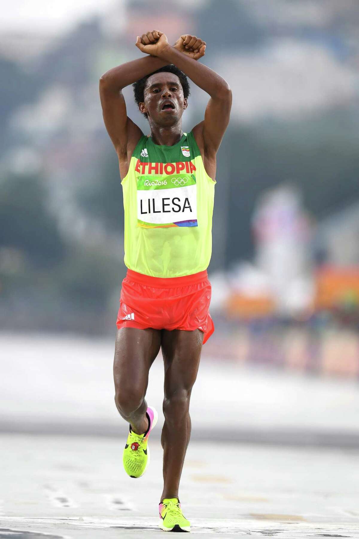 It was this sign while winning silver in the marathon at the Rio Olympics that got Feyisa Lilesa in hot water with the Ethiopian government.﻿