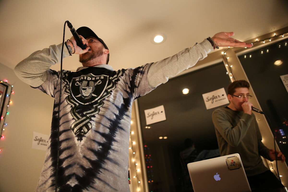 From left: Troy Boyd (a.k.a. Obvi) and Stephan Roubinian (a.k.a. Catalyst Bars) of "Alien Family" rap during a Sofar Sounds concert on Friday, Jan. 13, 2017, in San Francisco, Calif. The concert was held at a house in the Twin Peaks neighborhood. The exact venue location is a secret, as is the talent scheduled to perform until the day of the concert.