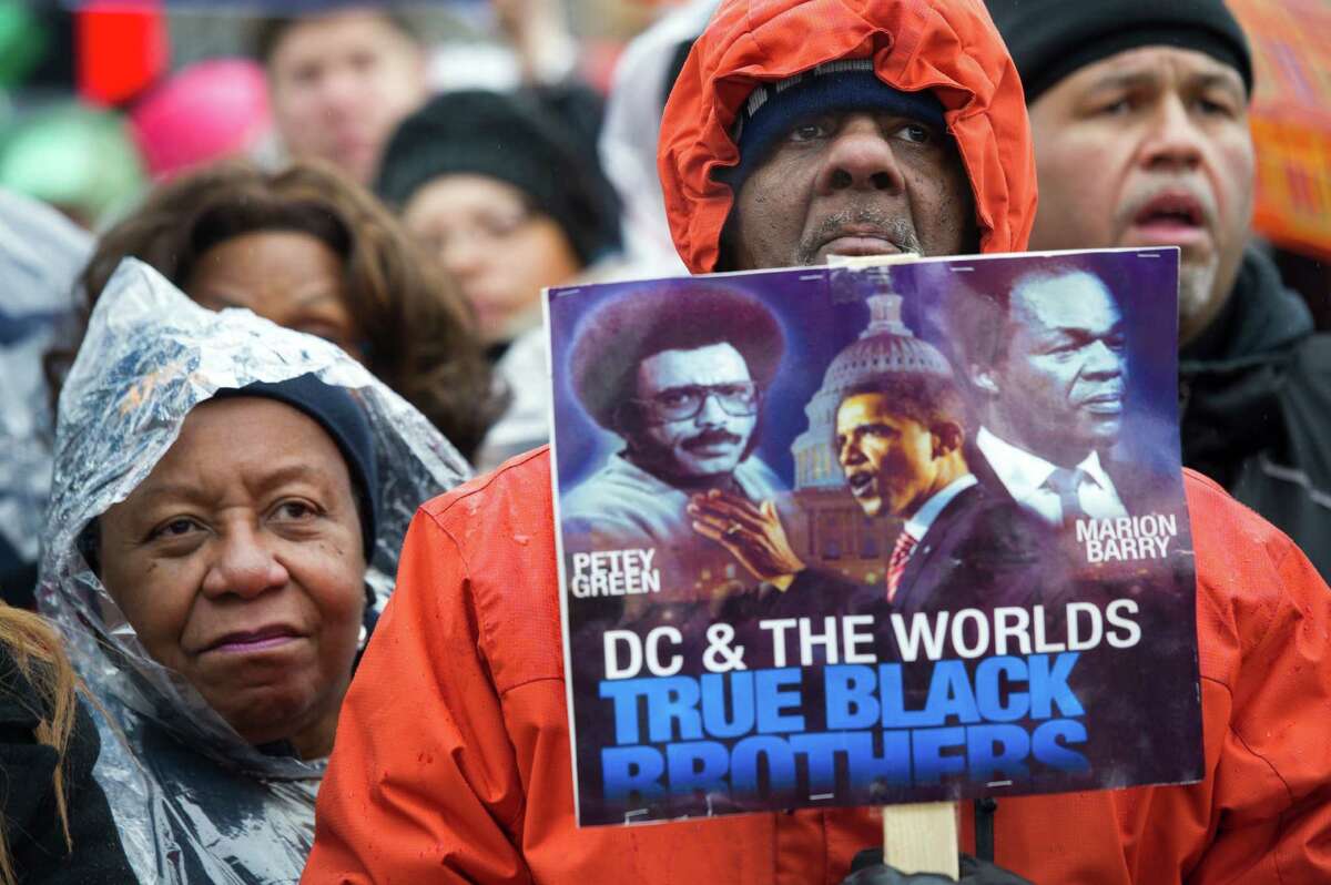 Civil rights advocates rally to honor the Rev. Martin Luther King, Jr. in Washington, Saturday, Jan. 14, 2017. The National Action Network, the group founded by the Rev. Al Sharpton, is sponsoring Saturday's "We Shall Not Be Moved" march and rally ahead of Monday's Martin Luther King Jr. Day holiday. (AP Photo/Cliff Owen)