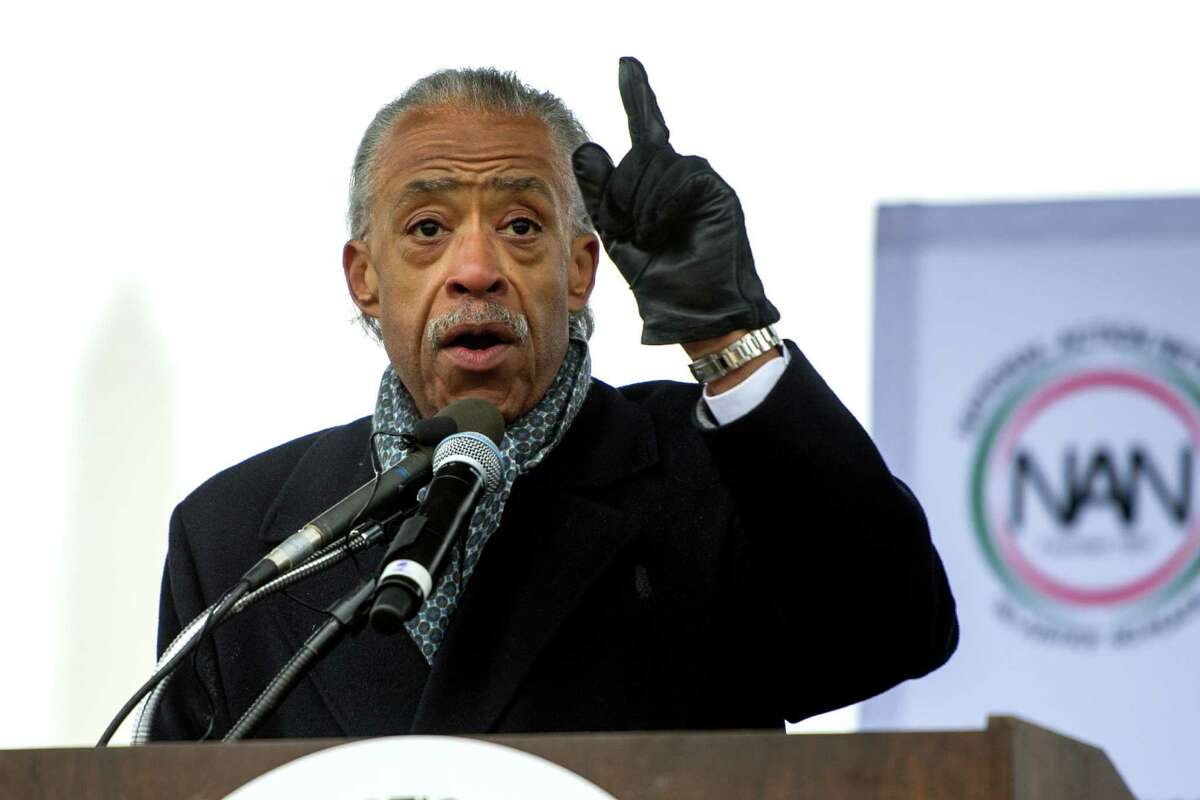 Rev. Al Sharpton speaks at a rally to honor the Rev. Martin Luther King, Jr. in Washington, Saturday, Jan. 14, 2017. The National Action Network, the group founded by the Rev. Al Sharpton, is sponsoring Saturday's "We Shall Not Be Moved" march and rally ahead of Monday's Martin Luther King Jr. Day holiday. (AP Photo/Cliff Owen)