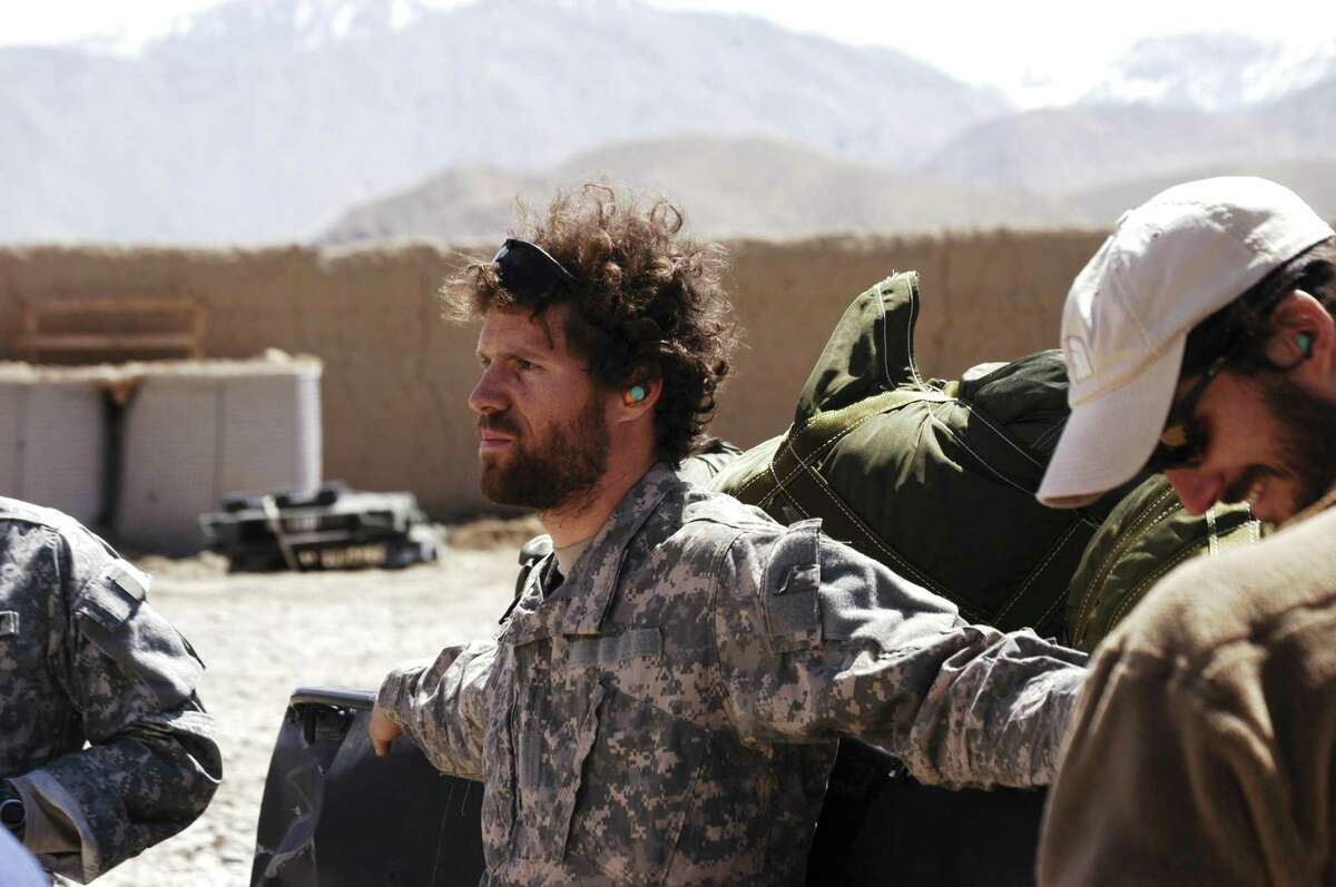 A bearded Steven Bellino stands on a base in Afghanistan. Undated. Photo courtesy of Scott Workman.