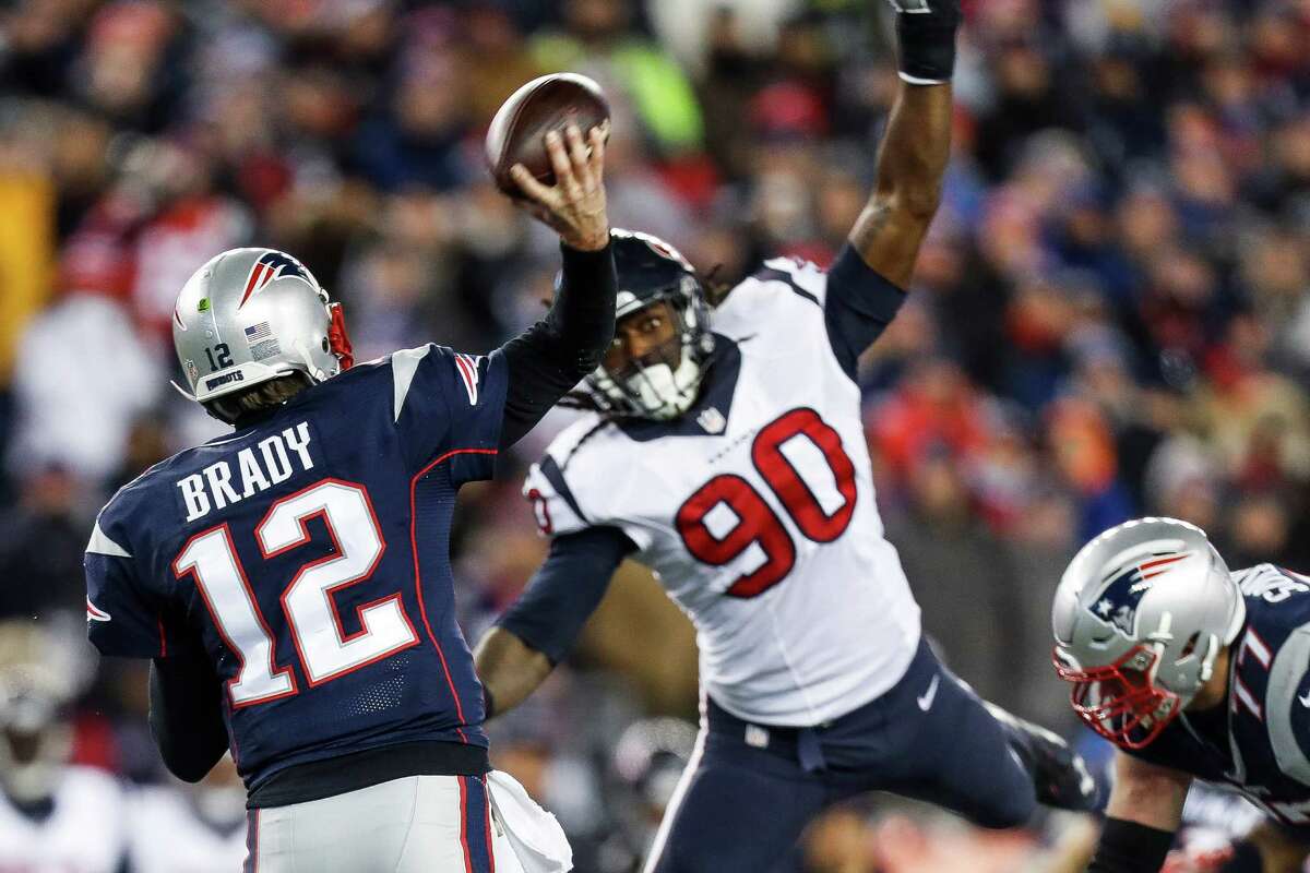 Houston Texans defensive end Jadeveon Clowney (90) attempts to block a pass by New England Patriots quarterback Tom Brady (12) during the third quarter of an NFL divisional playoff game at Gillette Stadium, Saturday, January 14, 2017. ( Karen Warren / Houston Chronicle )