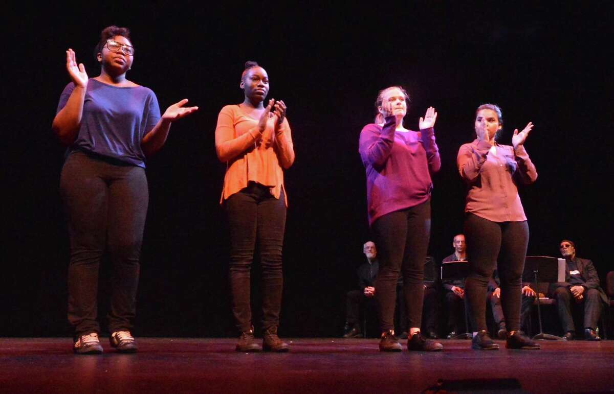 Students with Regional Center for the Arts in Trumbull perform “A World that Listens” during the King celebration at the Westport Country Playhouse.