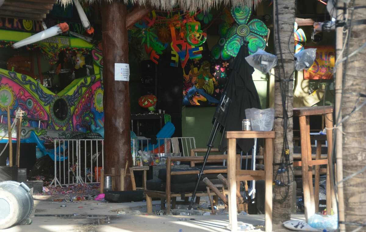 View of the Blue Parrot nightclub in Playa del Carmen, Quintana Ro state, Mexico where 5 people were killed, three of them foreigners, during a music festival on January 16, 2017. A shooting erupted at an electronic music festival in the Mexican resort of Playa del Carmen early Monday, leaving at least five people dead and sparking a stampede, the mayor said. Fifteen people were injured, some in the stampede, after at least one shooter opened fire before dawn at the Blue Parrot nightclub during the BPM festival. / AFP / STR (Photo credit should read STR/AFP/Getty Images)