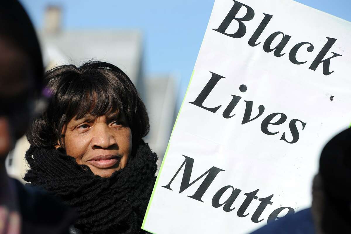 Joann Peterson takes part in the annual march marking Martin Luther King Jr. Day in Bridgeport, Conn. Jan. 16, 2017.