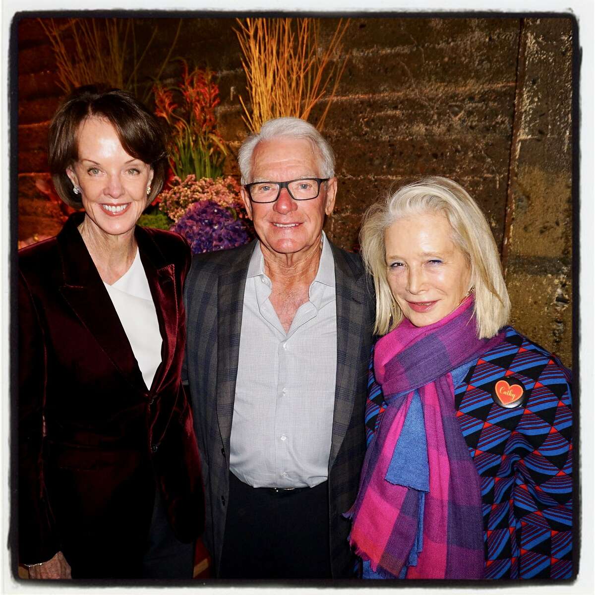 Helen (left) and Chuck Schwab with Fog honorary chair Mimi Haas at the benefactor party she hosted at the Stanlee Gatti Atelier in January 2017.