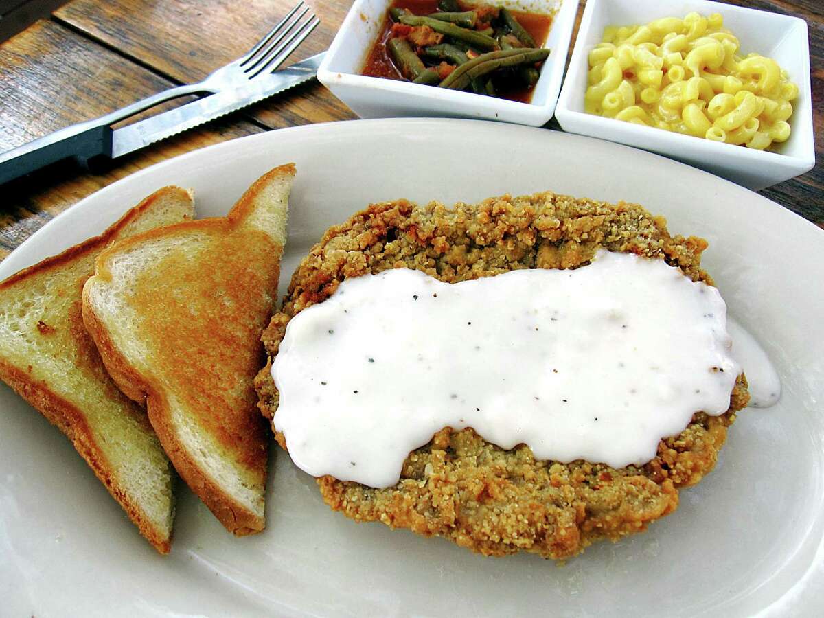 Chicken-fried steak with Texas toast and sides of stewed green beans and macaroni and cheese from Whiskey Tree Bar & Grill on Bandera Road.