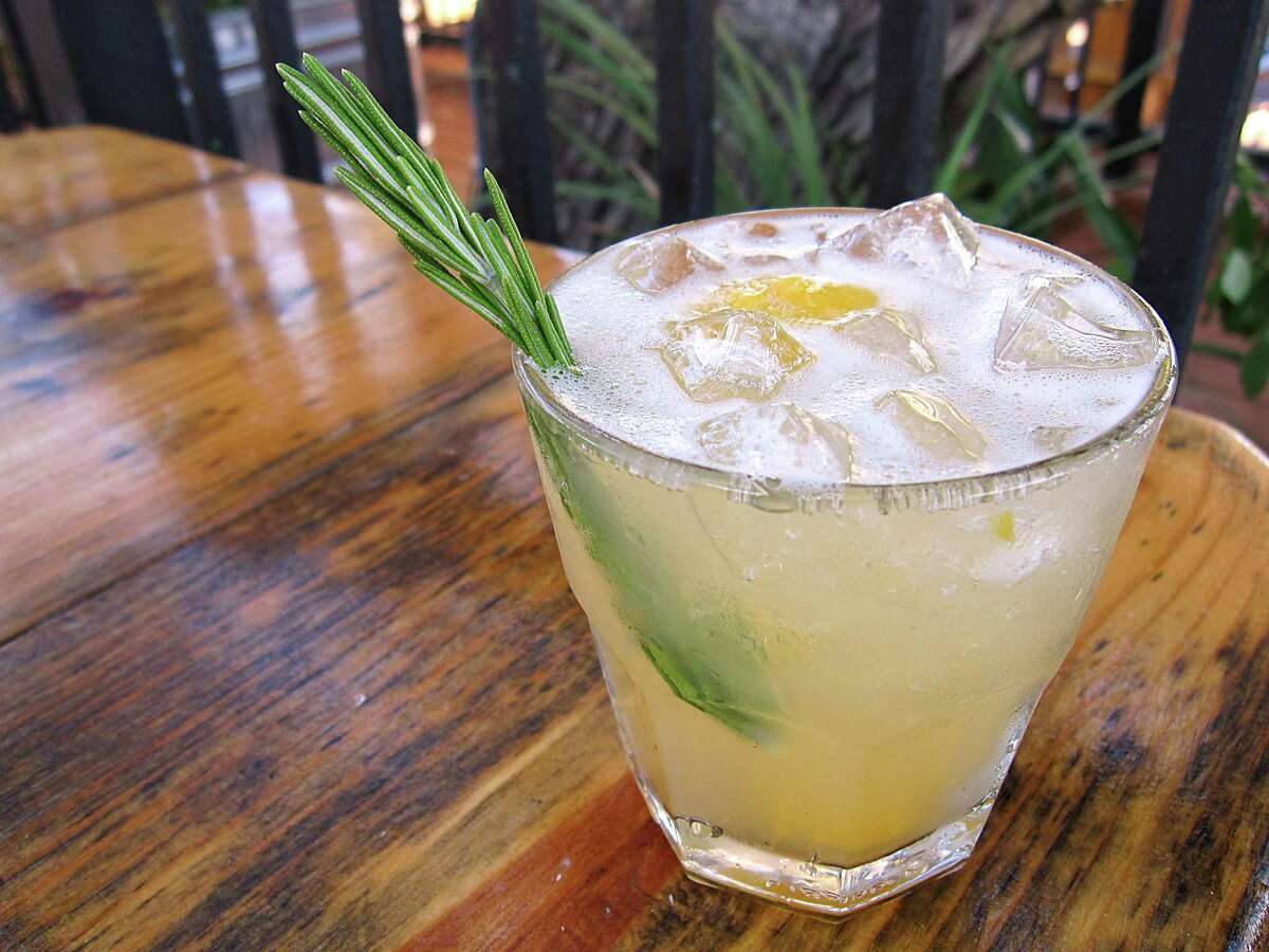 A cocktail called the Whiskey Tree High Fashion features Redemption rye, muddled peaches and fresh rosemary.