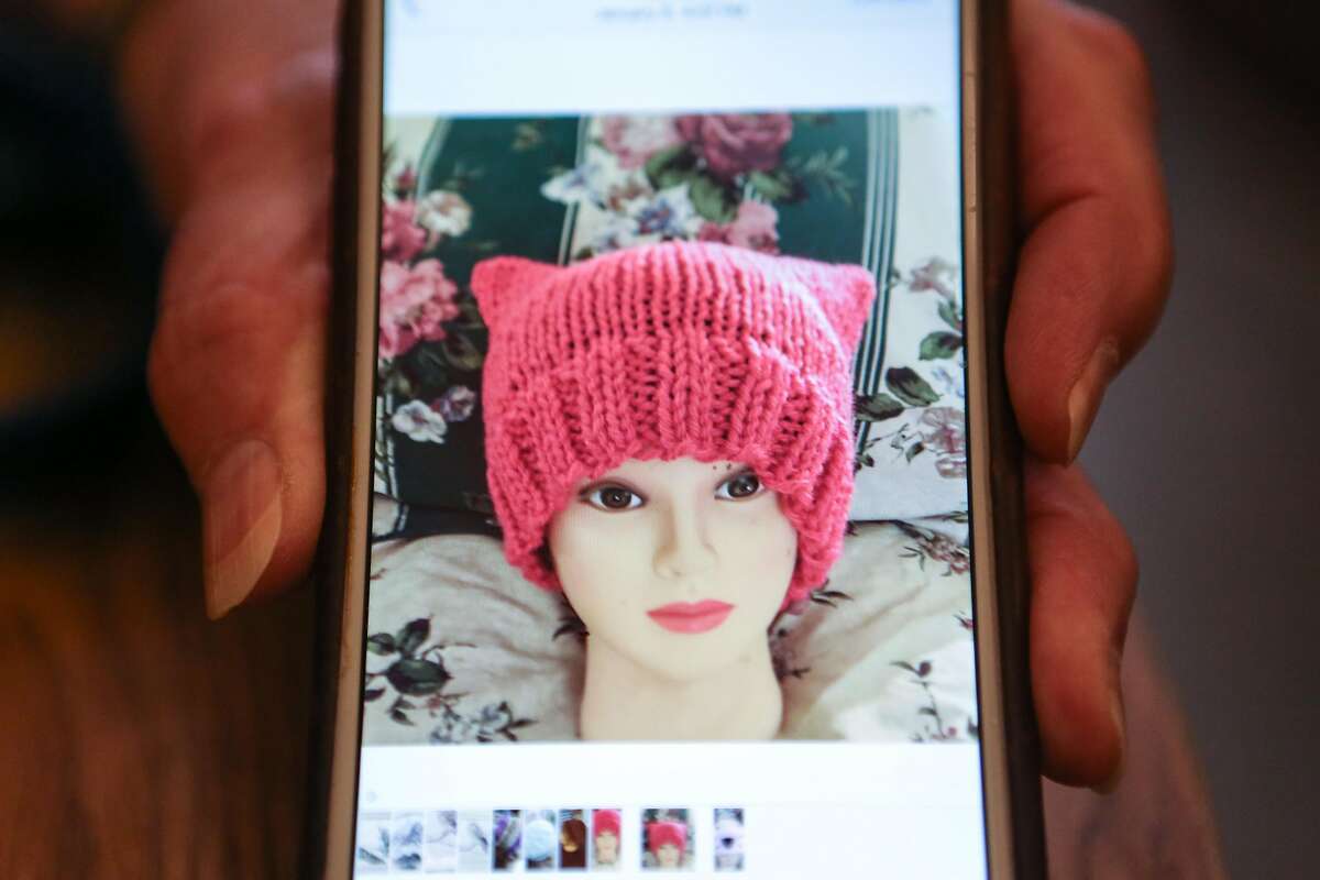 Beverly Edmonds displays an example of one of the hats she knit as part of the Pussyhat Project on Tuesday, January 17, 2017 in Benicia, Calif.