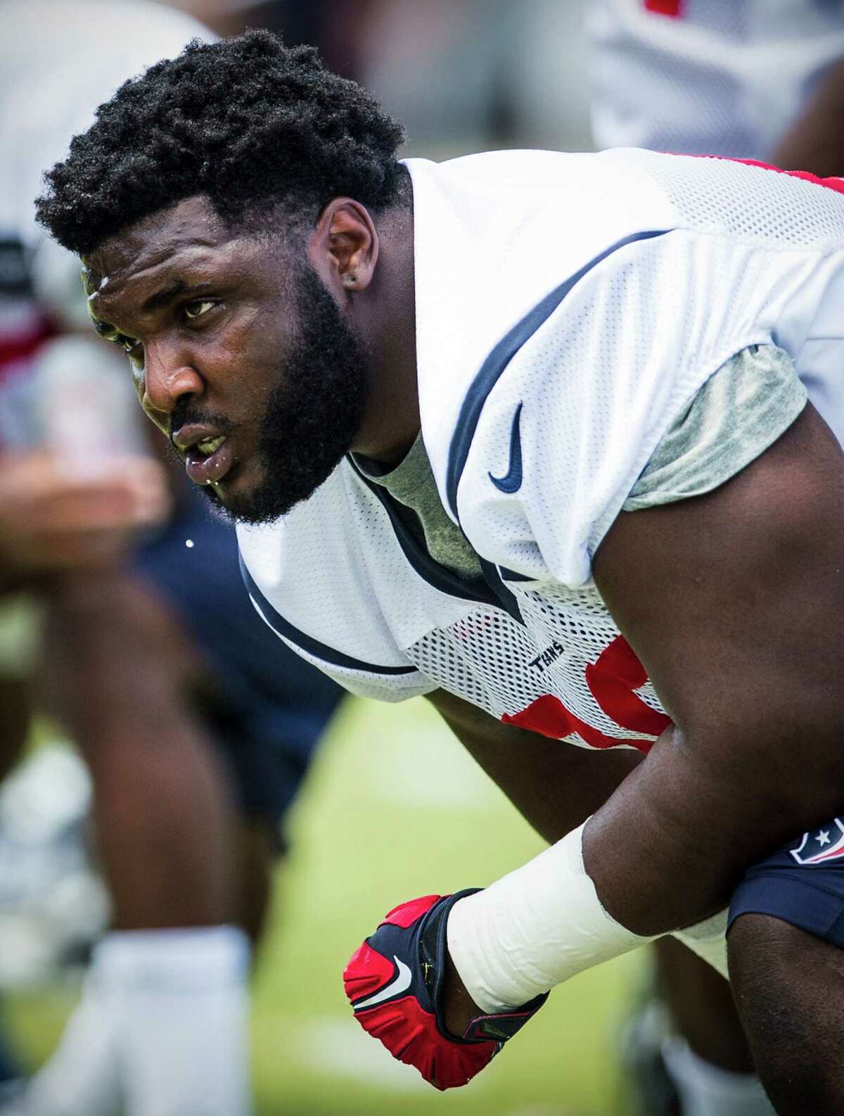 Houston Texans nose tackle D.J. Reader stretches during rookie mini camp at The Methodist Training Center on Saturday, May 7, 2016, in Houston. ( Brett Coomer / Houston Chronicle )